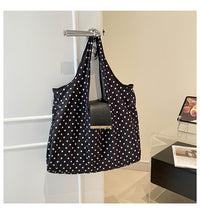 Polka dot black bag